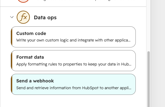 Choosing the Send a webhook action under Data ops in the HubSpot workflow