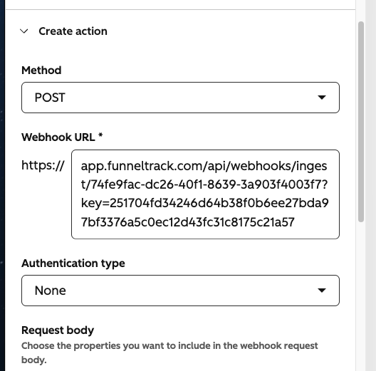 Pasting the FunnelTrack webhook URL into the HubSpot action